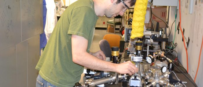 A person working on instrumentation